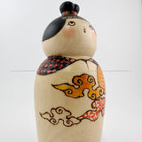 A cute, quirky sosaku kokeshi by award winning artist Hatsue Kato!