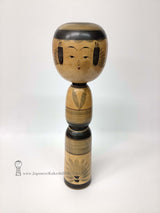 Tall Yajiro Kokeshi by Legendary Artisan This extra large kokeshi is more than 37 cm tall! It's by Tatsuo Sato, a kokeshi master from Miyagi Prefecture who made kokeshi until his death at age 82. Most Yajiro style kokeshi use colors like red, green, yellow and purple. This "all black" kokeshi is rare! We love it!