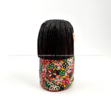 Enchanting Kokeshi Doll by Ichiko Yahagi.