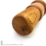 A photo showing the signature of kokeshi artist Shozan Shido