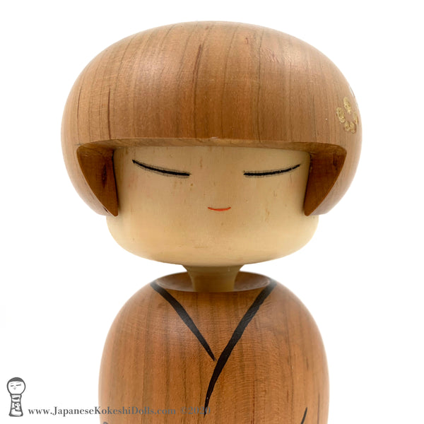An original, one-of-a-kind modern kokeshi doll by Isao Sasaki. Handmade in early 2020, this doll has sleepy eyes and a calm expression. Carved from premium hardwood with beautiful woodgrain. 