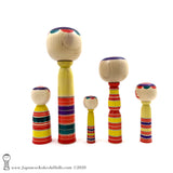 Kokeshi Family. Five Yajiro Kokeshi, Yellow with Stripes by Takashi Kamata. Dento Kokeshi.
