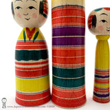Kokeshi Family. Five Yajiro Kokeshi, Yellow with Stripes by Takashi Kamata. Dento Kokeshi.