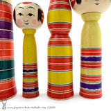 Kokeshi Family. Five Yajiro Kokeshi, Yellow with Stripes by Takashi Kamata. Dento Kokeshi.