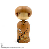 A one-of-a-kind sosaku kokeshi doll by Isao Sasaki. Hand-crafted in early 2020, this doll has sleepy eyes and a calm expression. A beautiful Japanese wooden doll made from premium hardwood with beautiful woodgrain.