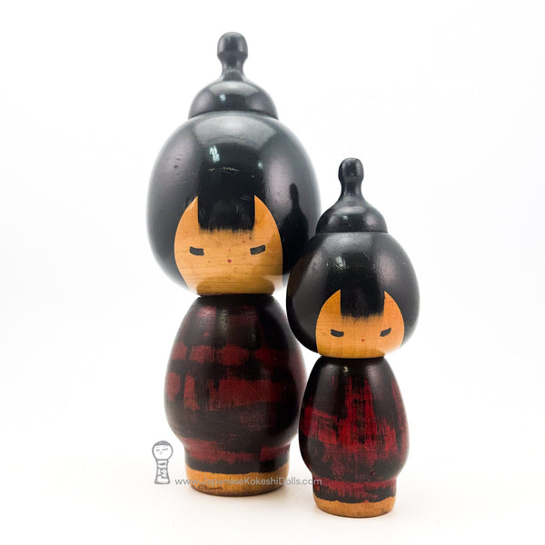 An amazing pair of rare kokeshi dolls from the 1960s by legendary master artisan Hideo Ishihara. Gorgeous curves, stylish design. Calming, beautiful faces.