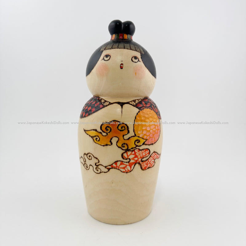 Kokeshi Doll by Award winning artist! If you like one-of-a-kind kokeshi dolls with lots of charm, this gal is for you! Award-winning kokeshi artisan Hatsue Kato created this doll as an official entry at the 2022 All-Japan Kokeshi Competition. Her name is "Sunrise" & she radiates warmth & joy! Only available here!