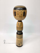 Tall Yajiro Kokeshi by Legendary Artisan    This extra large kokeshi is more than 37 cm tall! It's by Tatsuo Sato, a kokeshi master from Miyagi Prefecture who made kokeshi until his death at age 82. Most Yajiro style kokeshi use colors like red, green, yellow and purple. This "all black" kokeshi is rare! We love it!