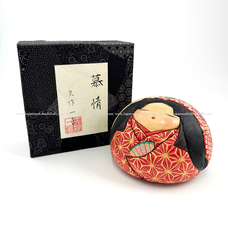 Brand New Creative (Sosaku) Kokeshi. Quirky and Beautiful!  Handmade circa 2019, this kokeshi doll by Ichiko Yahagi is so unique! Masterfully hand-carved and delicately hand-painted, the kokeshi has such an elegant-yet-enigmatic expression!. She is a triumph of artistry and craftsmanship. She is absolutely charming!