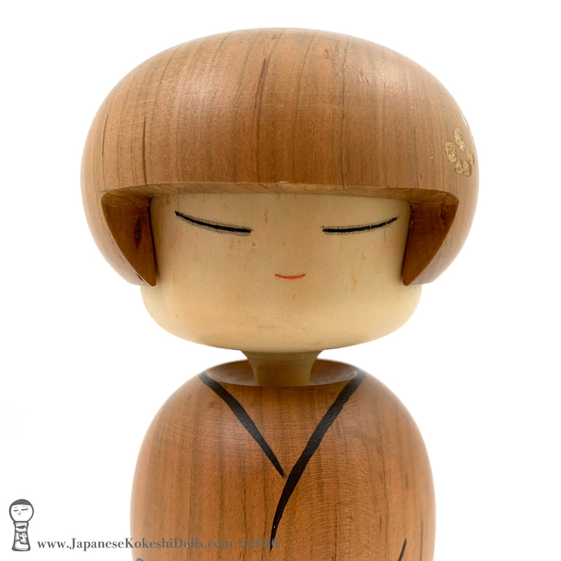 An original, one-of-a-kind modern kokeshi doll by Isao Sasaki. Handmade in early 2020, this doll has sleepy eyes and a calm expression. Carved from premium hardwood with beautiful woodgrain. 